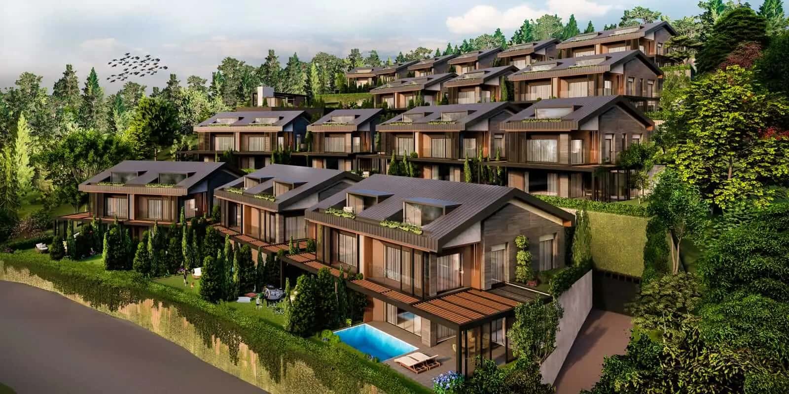 Ormanlık yamaca kademeli yerleştirilmiş, ahşap cepheli ve havuzlu villalardan oluşan konut yerleşimi görseli
