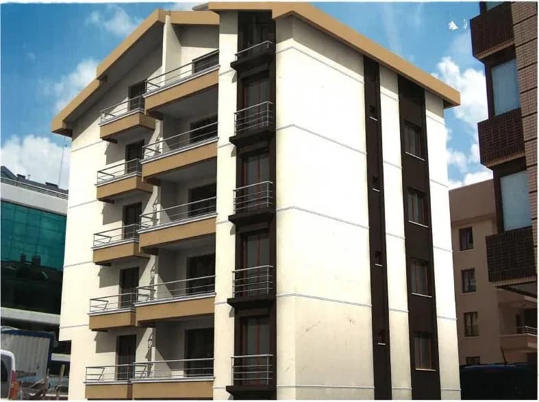 Beş katlı, balkonlu bir apartman binasının dış cephe görseli